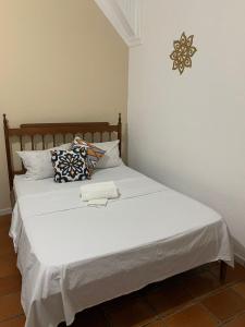 Postel nebo postele na pokoji v ubytování Pousada Real Paraty