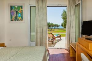 Photo de la galerie de l'établissement Xenios Anastasia Resort & Spa, à Nea Skioni