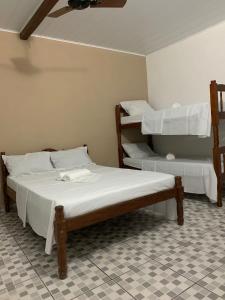 Postel nebo postele na pokoji v ubytování Pousada Real Paraty