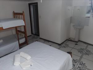 Postel nebo postele na pokoji v ubytování Pousada Real Paraty