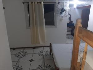 Postel nebo postele na pokoji v ubytování Pousada Real Paraty