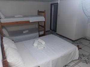 Postel nebo postele na pokoji v ubytování Pousada Real Paraty