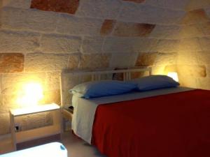 Postel nebo postele na pokoji v ubytování Cantaluna B&B