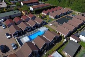 Foto da galeria de Holiday complex with the pool and volleyball in Miedzyzdroje em Międzyzdroje