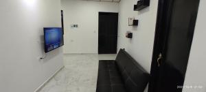 TV a/nebo společenská místnost v ubytování Hospedaje Bolivar Alcala
