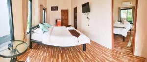 TV a/nebo společenská místnost v ubytování Noppakhun Resort