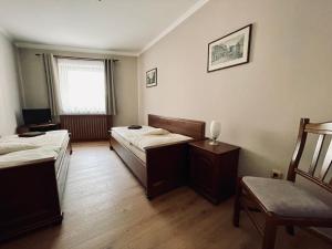 Postel nebo postele na pokoji v ubytování Pension Silvie