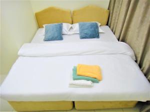 Abu Hail Star Residence - Home Stay客房内的一张或多张床位