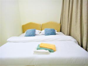 Abu Hail Star Residence - Home Stay客房内的一张或多张床位