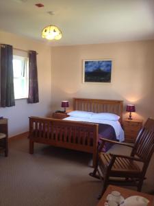 Ένα ή περισσότερα κρεβάτια σε δωμάτιο στο An Portán Guest House