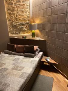 Postel nebo postele na pokoji v ubytování Epicuro guest house