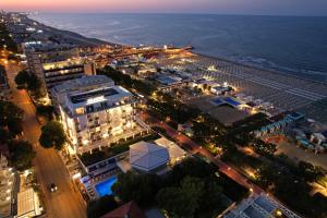 an overhead view of a city at night at Hotel Atlantic in Riccione