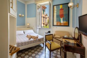 TV a/nebo společenská místnost v ubytování Hotel Emona Aquaeductus