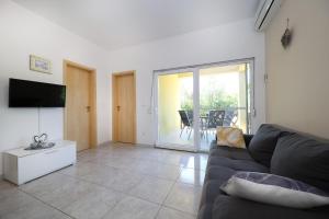 TV a/nebo společenská místnost v ubytování Apartments Kate