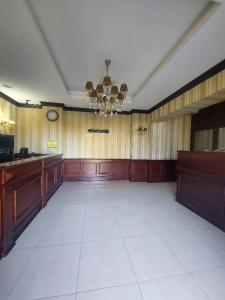 TV a/nebo společenská místnost v ubytování hotel pie d'or + 5 fotografií