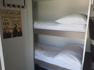 a couple of bunk beds in a room at Ein Gedi caravan by Dory caravan in Ein Gedi