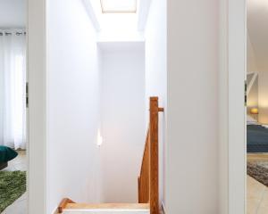Łóżko lub łóżka w pokoju w obiekcie Promenada by Baltic Home