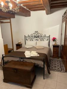 A bed or beds in a room at Affittacamere Mirella