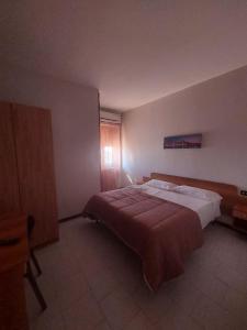 Postel nebo postele na pokoji v ubytování hotel pie d'or