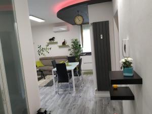 Posedenie v ubytovaní Appartamento Oasi Felice