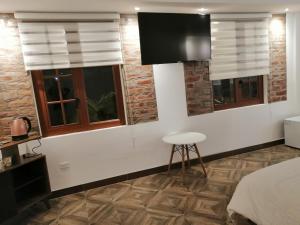 Letto o letti in una camera di Hostal & Spa Casa Real