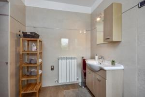 Kuchyň nebo kuchyňský kout v ubytování Apartman Grabar