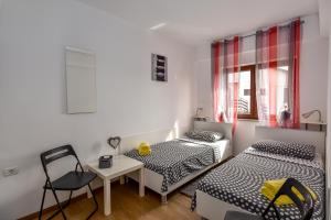 Postel nebo postele na pokoji v ubytování Apartman Grabar