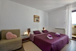 Postel nebo postele na pokoji v ubytování Apartman Grabar