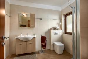 Koupelna v ubytování Apartman Grabar + 22 fotografií