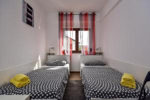 Postel nebo postele na pokoji v ubytování Apartman Grabar