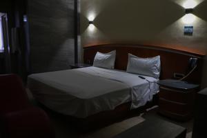 Voodi või voodid majutusasutuse Autohotel Ilussion toas