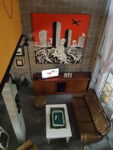 TV a/nebo společenská místnost v ubytování Casa con pileta LA PLATA