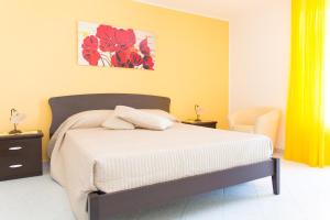 Postel nebo postele na pokoji v ubytování B&B La Casa nel Borgo