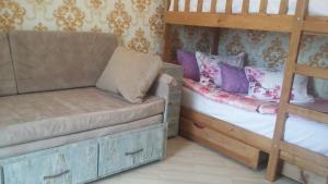 Ένα ή περισσότερα κρεβάτια σε δωμάτιο στο 1 Room Deluxe Apartment in Bakuriani