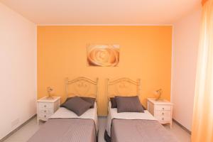 Postel nebo postele na pokoji v ubytování B&B La Casa nel Borgo