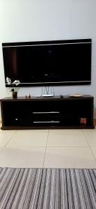 TV i/ili multimedijalni sistem u objektu Casa Recanto Cunha, 4 quartos, 10 min do Thermas