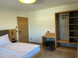 Postel nebo postele na pokoji v ubytování HAUSZEIT APPARTEMENTS