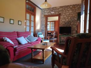 TV a/nebo společenská místnost v ubytování Finca el Palacio