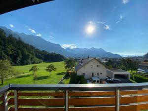 a view from the balcony of a house with mountains at Appartement Schillerkopf in Bludenz