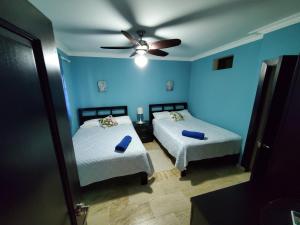 Cama o camas de una habitación en Susy Penthouse