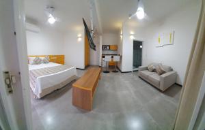 Cama ou camas em um quarto em Juquei Frente ao Mar Hotel Pousada