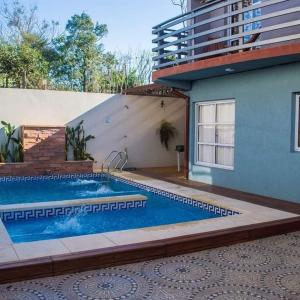 Бассейн в LA MARTINA APART HOTEL или поблизости