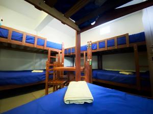 Postel nebo postele na pokoji v ubytování Lima House Hostel