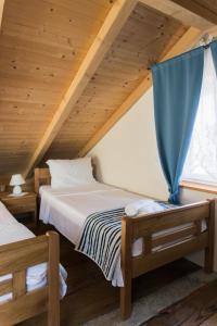 Posteľ alebo postele v izbe v ubytovaní Rustic Apartment Mariva