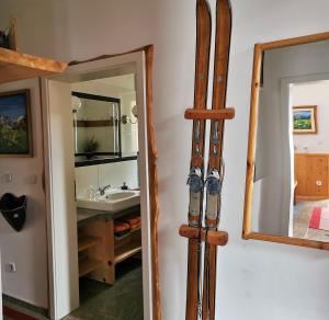 a pair of skis leaning against a wall in a bathroom at Chalet Magda-Lena in Heiligenblut +96 photos