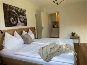 Łóżko lub łóżka w pokoju w obiekcie Seaways Apartments