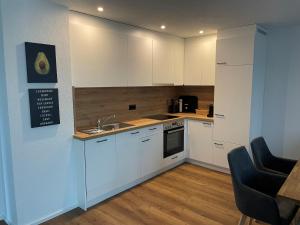 Kuchnia lub aneks kuchenny w obiekcie Seaways Apartments