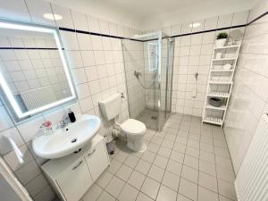 Ett badrum på Ferienwohnung Augenblick - Stylisches Apartment in der besten Altstadtlage von Erfurt