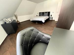 Khu vực ghế ngồi tại Ferienwohnung Augenblick - Stylisches Apartment in der besten Altstadtlage von Erfurt