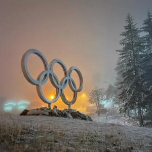 a statue of the olympic rings in the snow at Planinska kuća Kamin in Jahorina